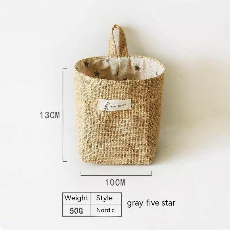 Wall-mounted jute storage bag for home organisation