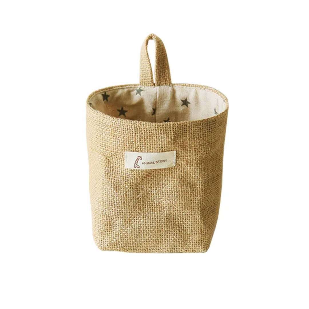Wall-mounted jute storage bag for home organisation